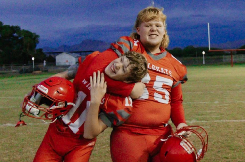 2 boys in football gear